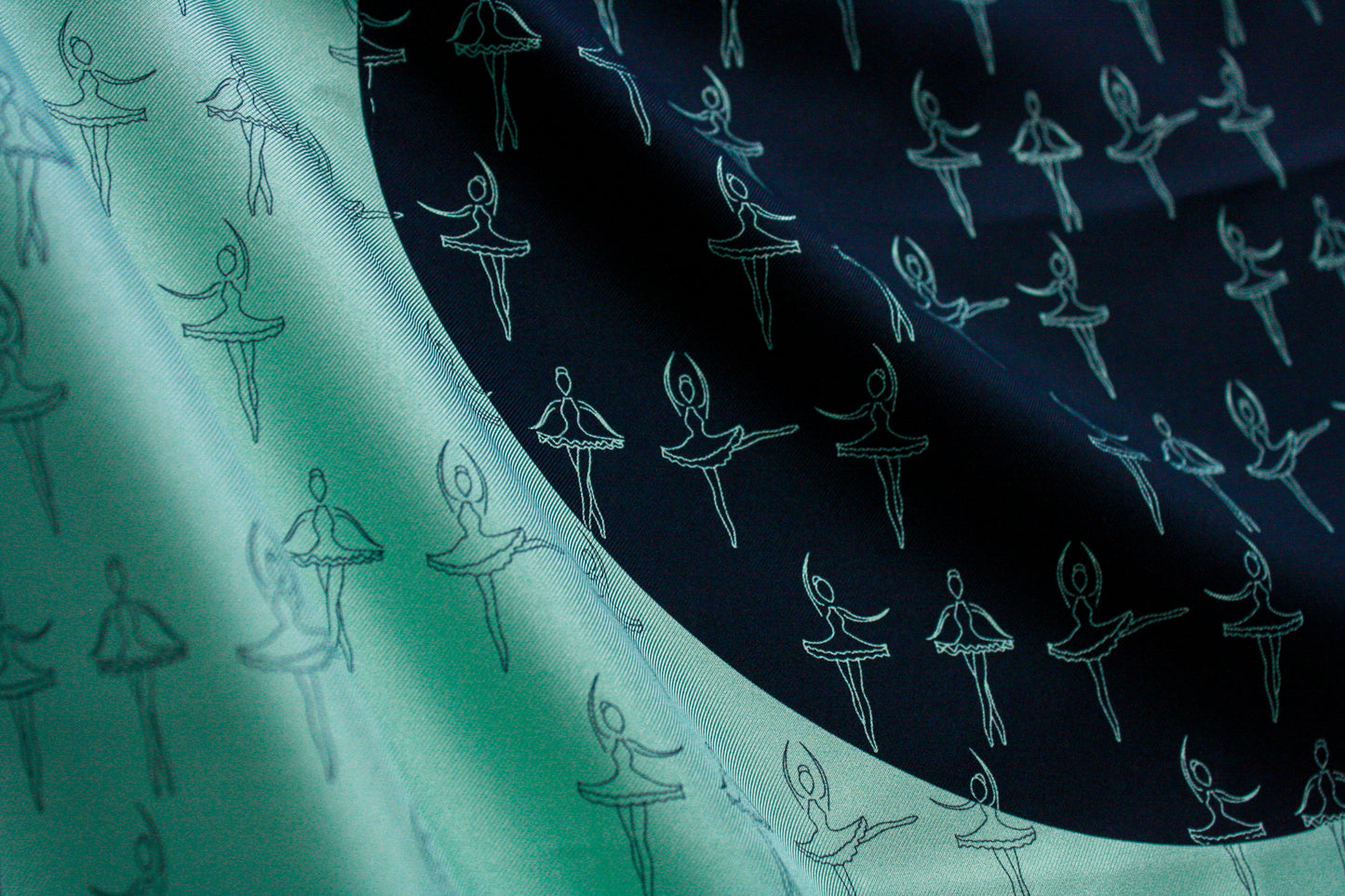 Close up of details of Ballet - The Poised Rogue 60x60cm cool green silk scarf with black ballerina lineart
