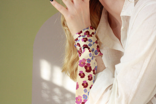 Silk twilly scarf, Heart`s Ease, flowers on champagne silk on model, by The Line Atelier