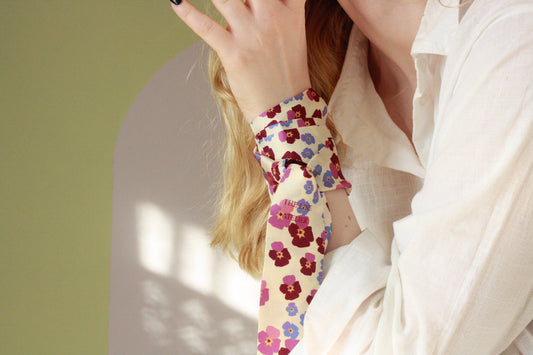 Silk twilly scarf, Heart`s Ease, flowers on champagne silk on model, by The Line Atelier