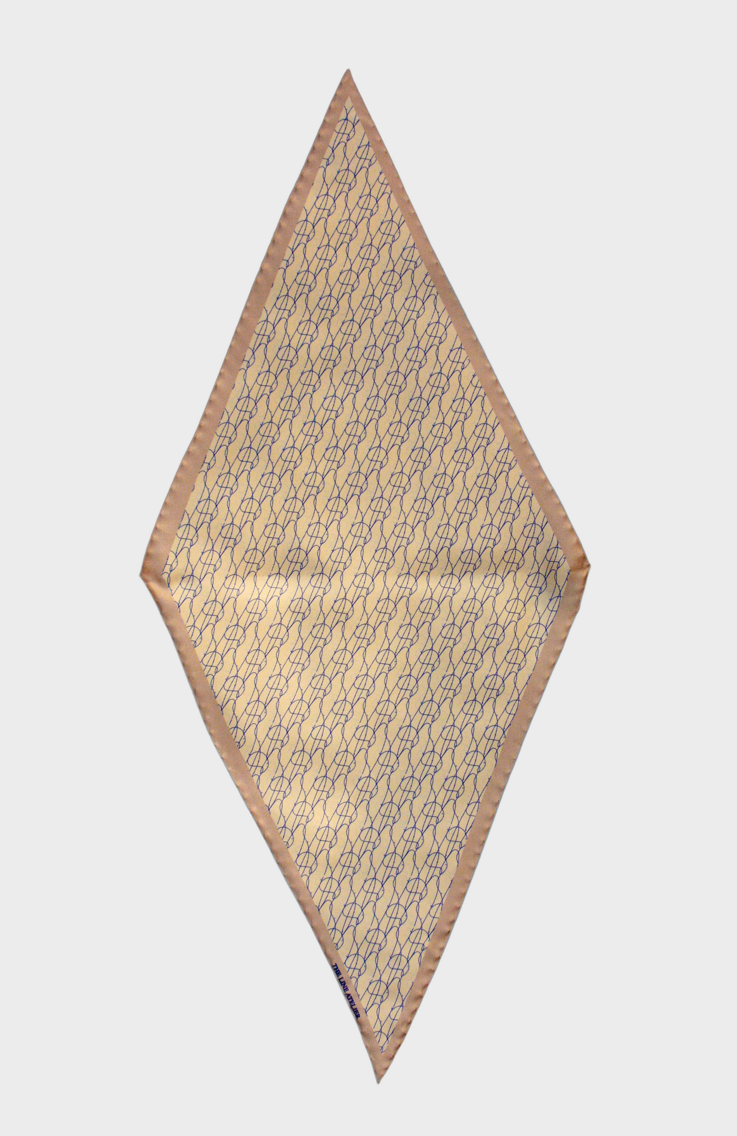 Diamond silk scarf in camel with abstract blue design