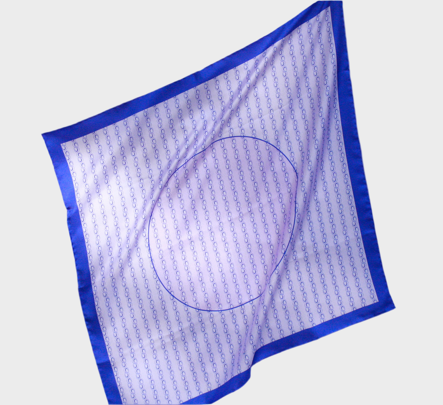 60cm square silk scarf with blue border and circular design on a beigebackground