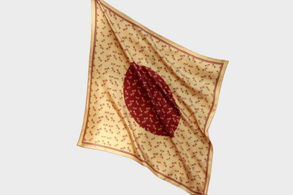 Golden 60cm silk scarf with a auburn dragonfly design on a beige background