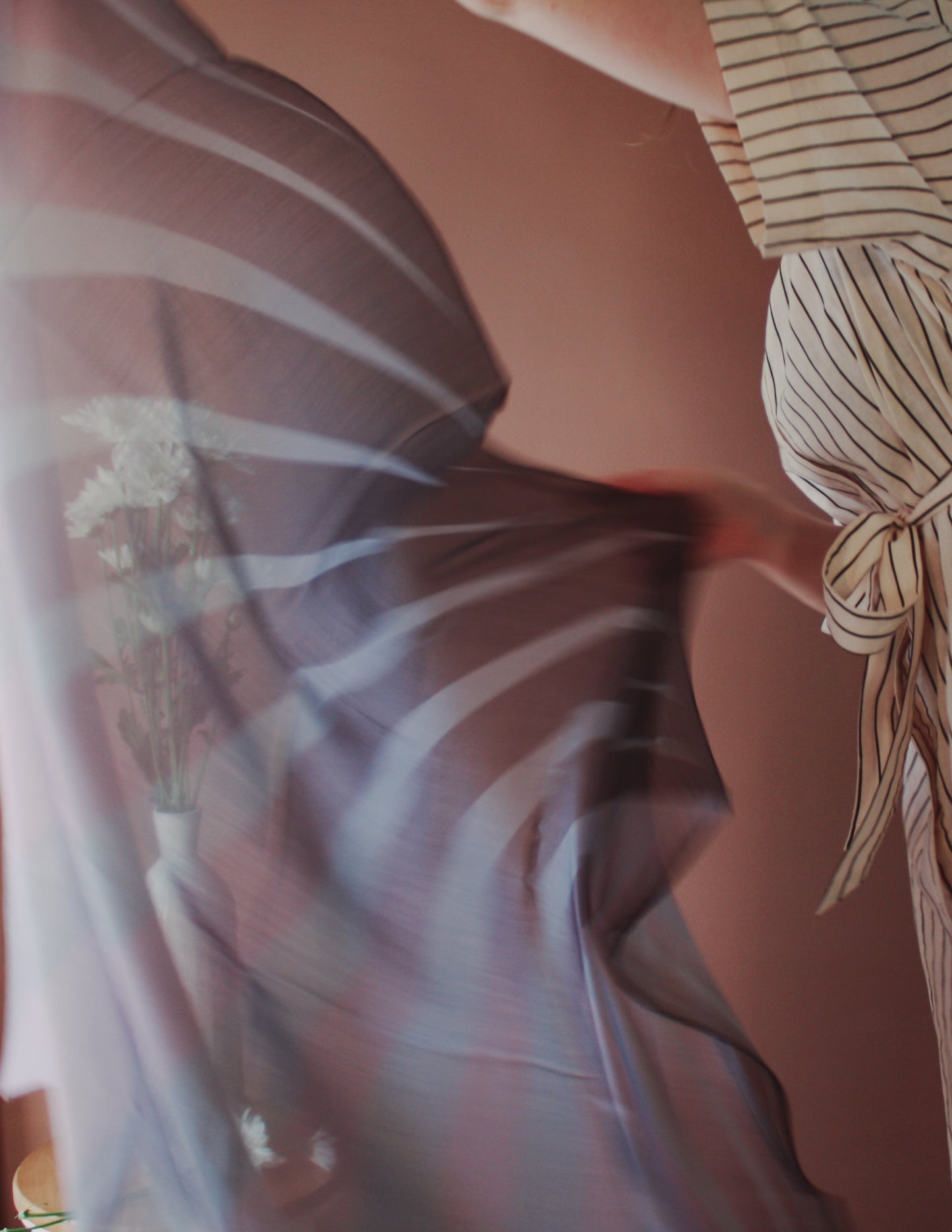 Model holding Love Potion nr 9 Silk & Wool scarf by The Line Atelier