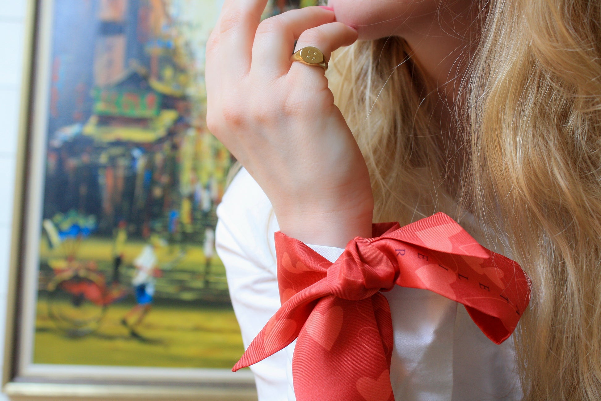 Silk twilly scarf, Lover`s Whimsy, red with heart pattern, model photo