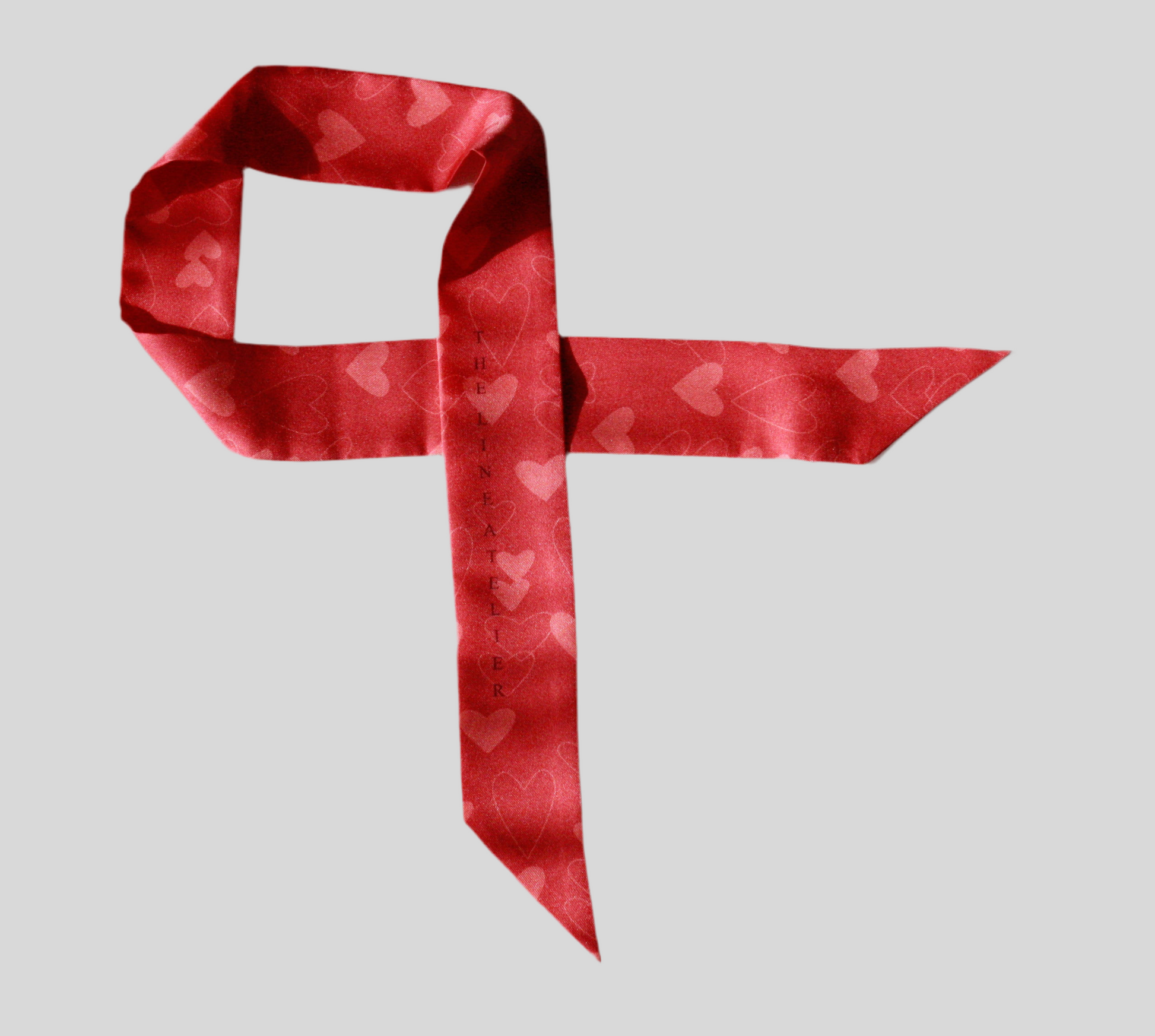 Lovers Whimsy Silk Twilly Scarf, red with heart pattern, made in England