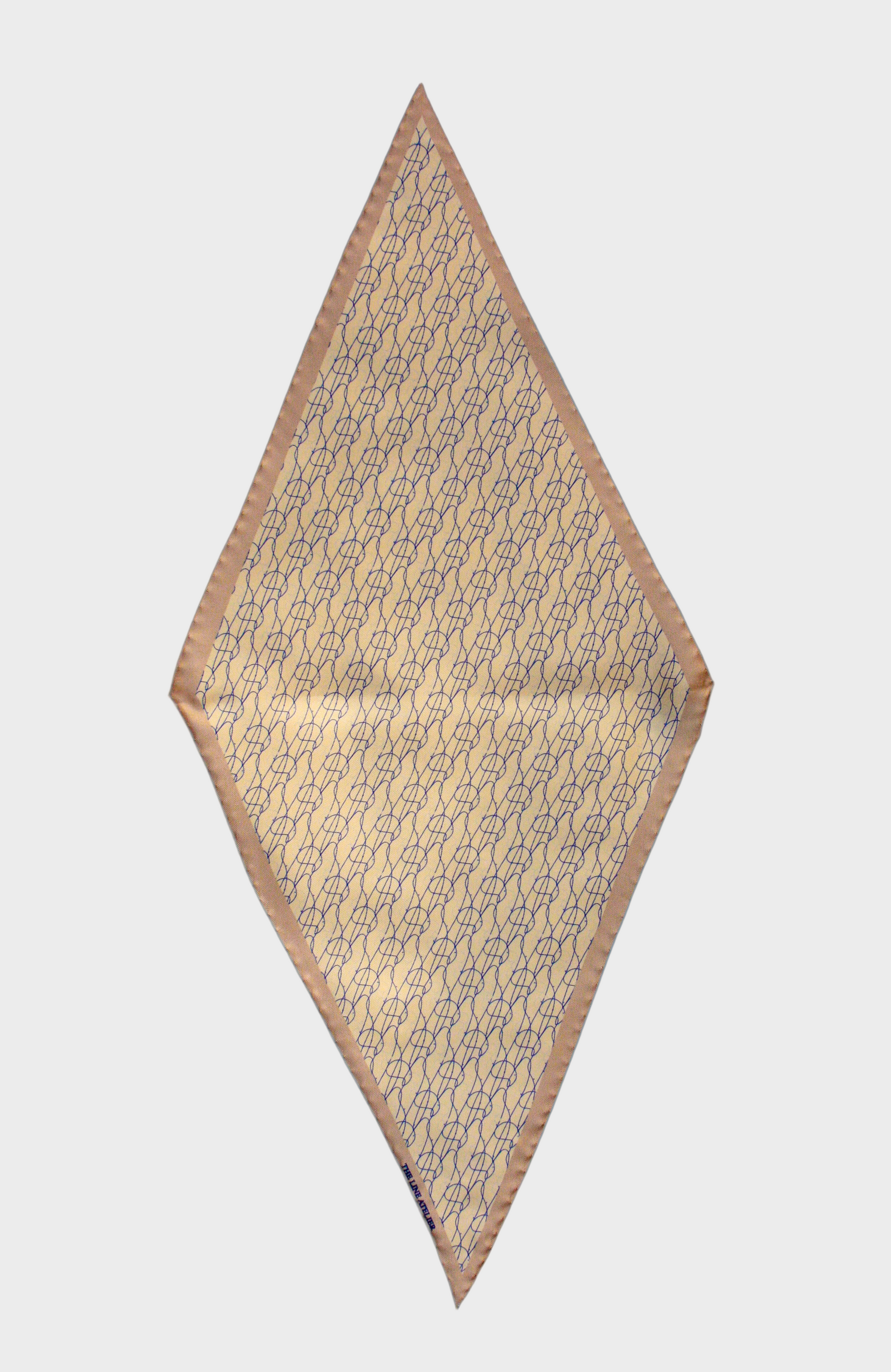 Diamond silk scarf in camel with abstract blue design