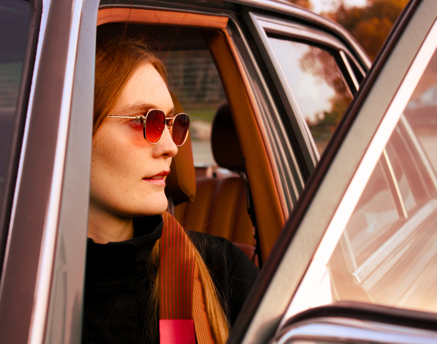 Model wearing brown with pink pinstripes Sable Wiles Twilly Silk Scarf by The Line Atelier